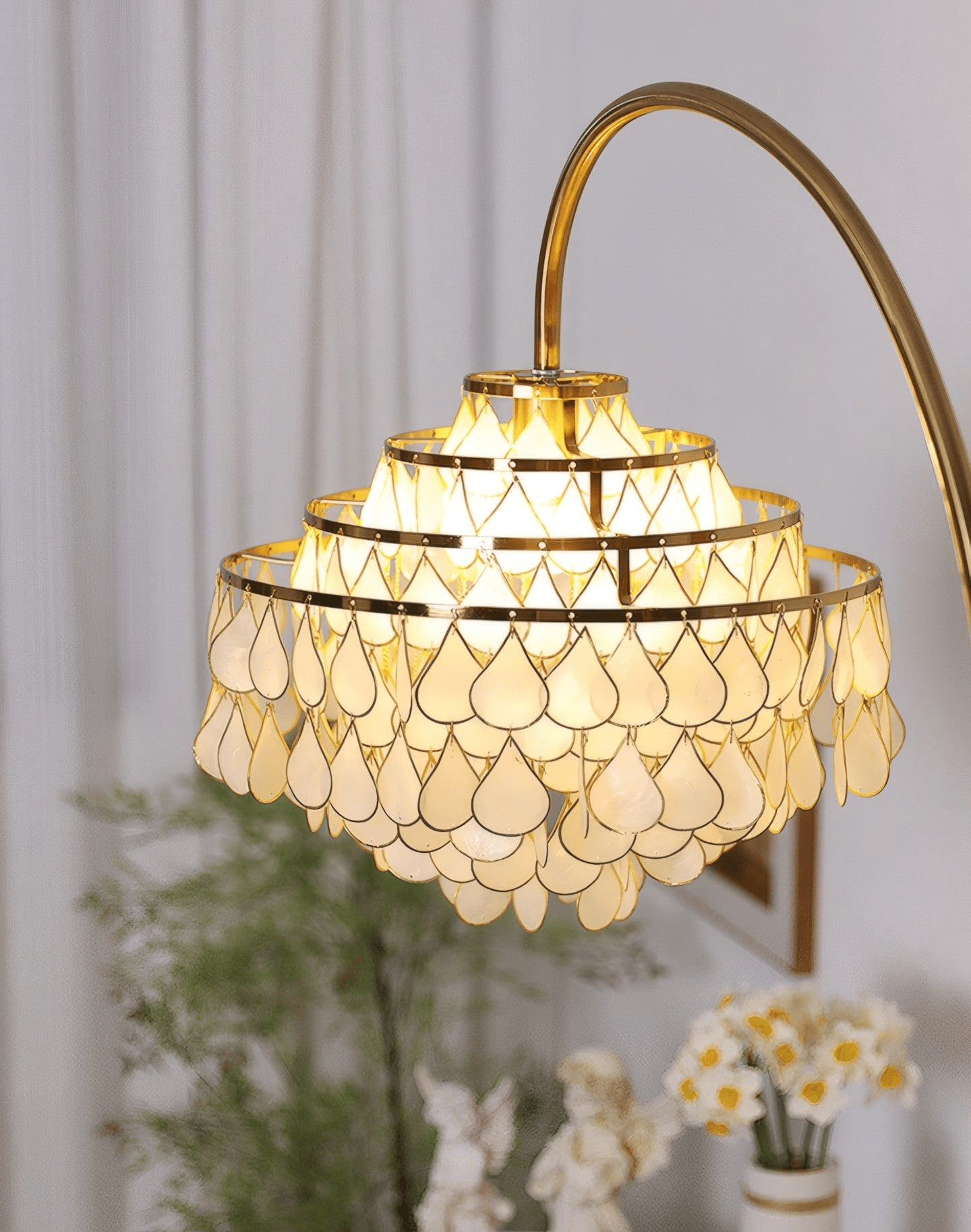 Luminaire coquillages bronze - vue rapprochée finition plaquée artisanale